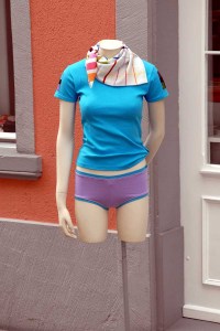 Float a mannequin on a bracket on the outside of your resale shop