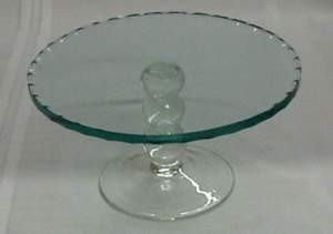 Basic cake plates are great risers in a showcase