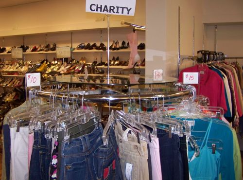 This charity rack in a consignment shop is divided into easily-shopped segments, by price.