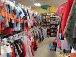 Crowded racks in a children's consignment shop