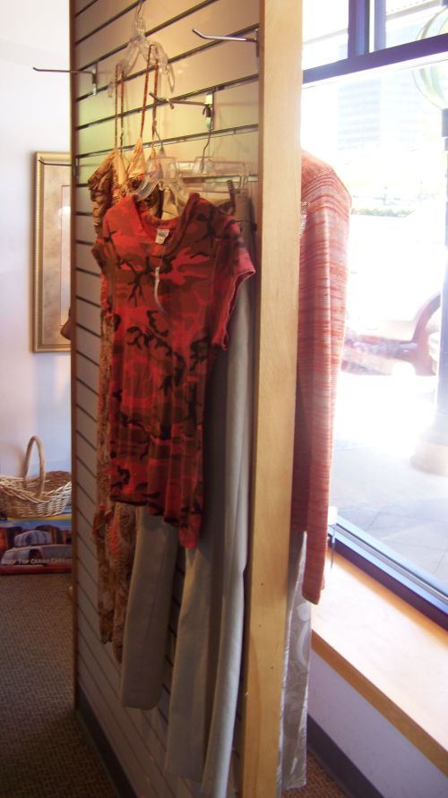 Double-sided window display in a nonprofit consignment thrift store St. Louis