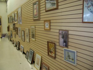 How much better would this wall look with some arranging... and hanging?