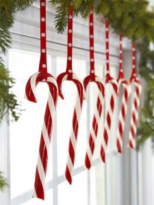 Giant candy cane yard ornaments WOW in our consignment shop window