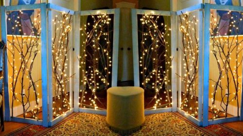 Make a window backdrop with twinkle lights in your consignment shop