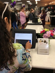 Preparing to sell her goods to Clothes Mentor. Photo by TGtbT.com