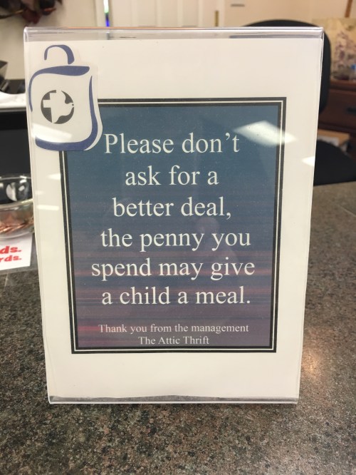 Sign in a thrift shop, snapped by Kate Holmes of TGtbT.com